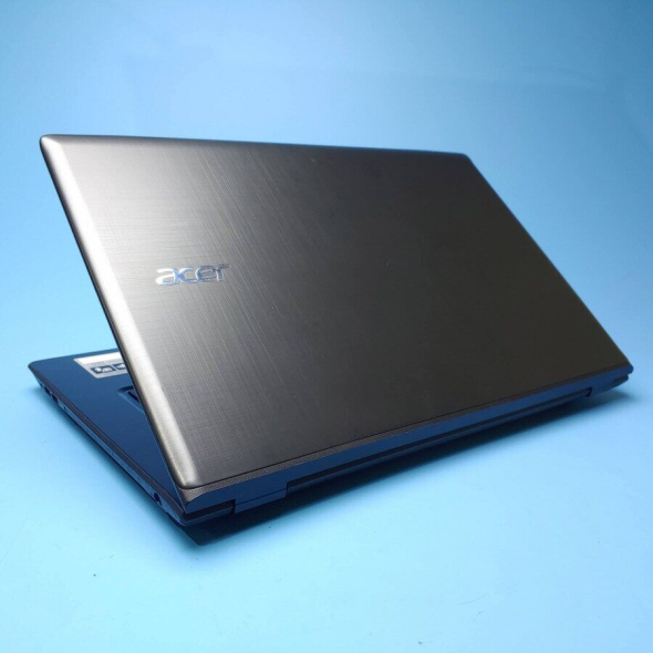 Игровой ноутбук Acer Aspire E5-774G-52W1 / 17.3&quot; (1920x1080) TN / Intel Core i5-7200U (2 (4) ядра по 2.5 - 3.1 GHz) / 8 GB DDR4 / 256 GB SSD / nVidia GeForce 940MX, 2 GB DDR3, 64-bit / WebCam / Win 10 Home - 7
