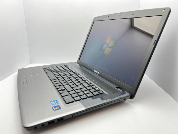Ноутбук Medion Akoya E7220 / 17.3&quot; (1600x900) TN / Intel Core i3-2310M (2 (4) ядра по 2.1 GHz) / 4 GB DDR3 / 1000 GB HDD / Intel HD Graphics 3000 / WebCam / USB 3.0 - 4