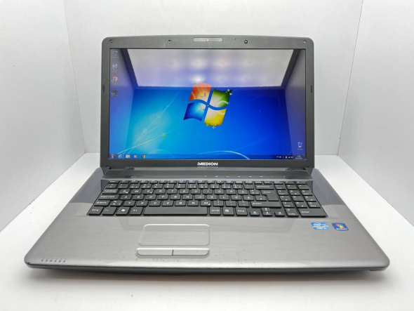 Ноутбук Medion Akoya E7220 / 17.3&quot; (1600x900) TN / Intel Core i3-2310M (2 (4) ядра по 2.1 GHz) / 4 GB DDR3 / 1000 GB HDD / Intel HD Graphics 3000 / WebCam / USB 3.0 - 2