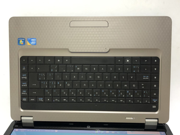 Ноутбук HP Compaq G62 Brown / 15.6&quot; (1366x768) TN / Intel Core i3-330M (2 (4) ядра по 2.13 GHz) / 4 GB DDR3 / 500 Gb HDD / Intel HD Graphics / WebCam / DVD-ROM - 8