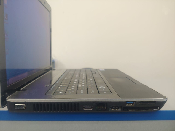 Ноутбук Б класс DakTech PlaidBook SP15R-UMA Grey / 15.6&quot; (1366x768) TN / Intel Core i3-2310M (2 (4) ядра по 2.1 GHz) / 4 GB DDR3 / 320 GB HDD / WebCam / HDMI - 13