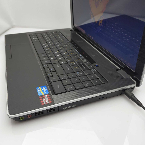 Ноутбук Б класс DakTech PlaidBook SP15R-UMA Grey / 15.6&quot; (1366x768) TN / Intel Core i3-2310M (2 (4) ядра по 2.1 GHz) / 4 GB DDR3 / 320 GB HDD / WebCam / HDMI - 4