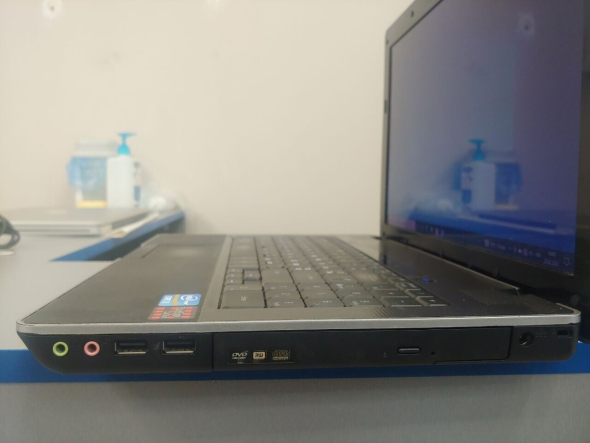 Ноутбук Б класс DakTech PlaidBook SP15R-UMA Grey / 15.6&quot; (1366x768) TN / Intel Core i3-2310M (2 (4) ядра по 2.1 GHz) / 4 GB DDR3 / 320 GB HDD / WebCam / HDMI - 14