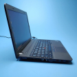 Ноутбук Lenovo ThinkPad E565 / 15.6" (1366x768) TN / AMD A6-8500P (2 ядра по 1.6 - 3.0 GHz) / 4 GB DDR3 / 250 GB SSD / AMD Radeon R5 Graphics / WebCam / DVD-ROM / Win 10 Pro - 4