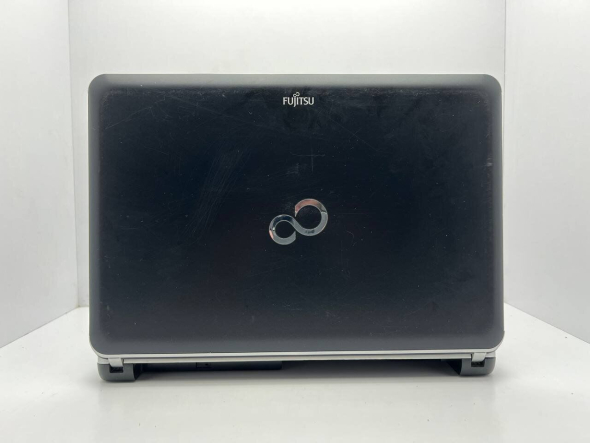 Ноутбук Б-класс Fujitsu LifeBook LH531 / 14&quot; (1366x768) TN / Intel Core i5-2430M (2 (4) ядра по 2.4 - 3.0 GHz) / 4 GB DDR3 / 500 GB HDD / Intel HD Graphics 3000 / WebCam / Без батареи - 5